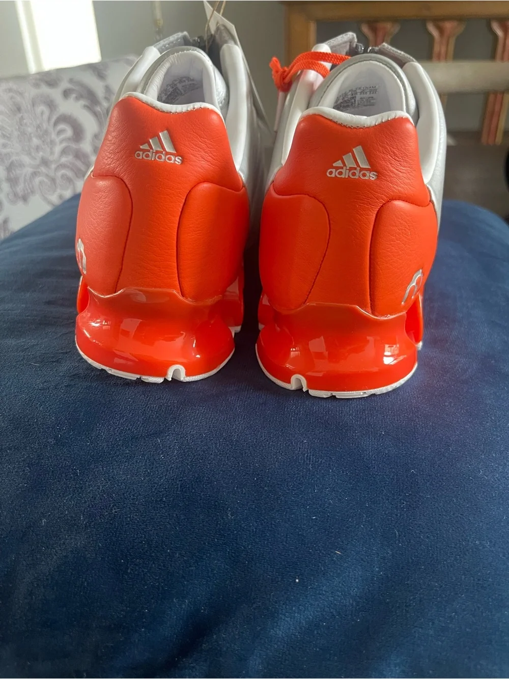 Men's Silver Athletic Sneakers with Orange Accent